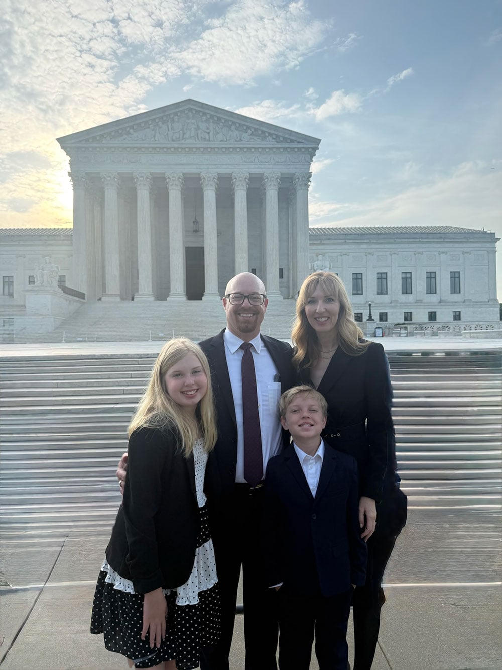 Attorney Joshua R. Jachimowicz with family in front of Supreme Court